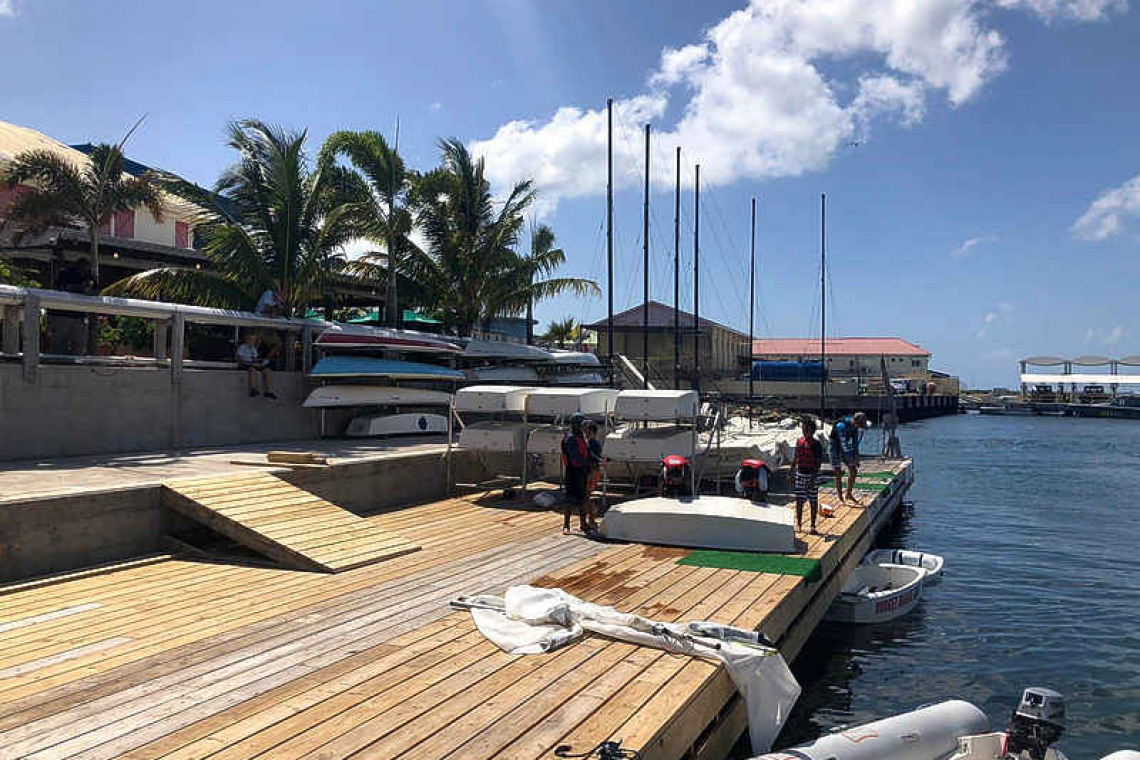 Dock at St. Maarten Yacht Club  rebuilt after mega-yacht accident