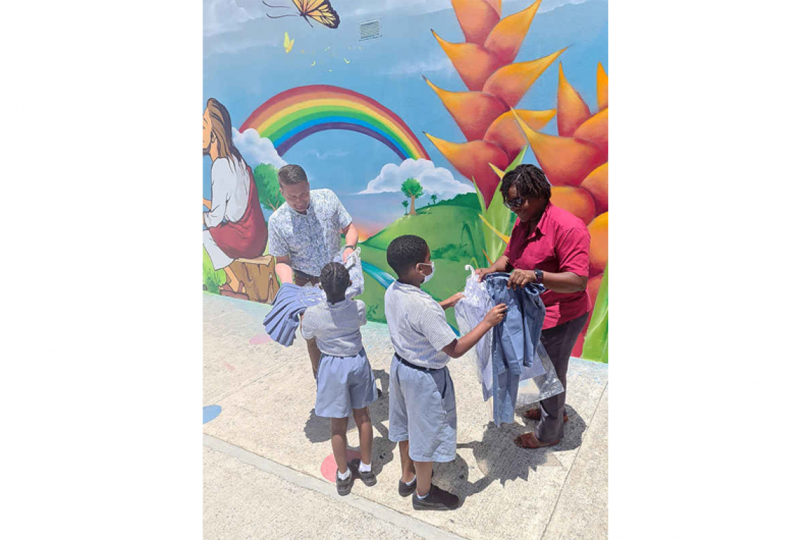400 school uniforms donated  by Childfund Sint Maarten