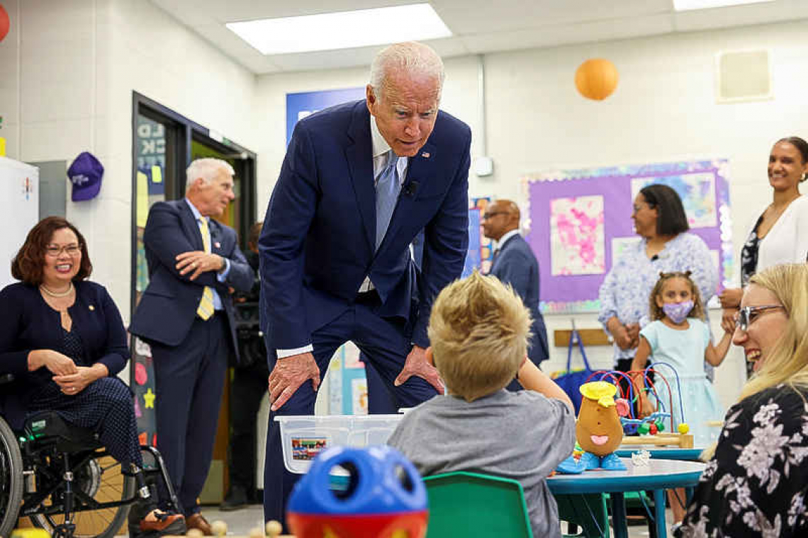 Biden sees child tax credit as 'giant step' to counter poverty