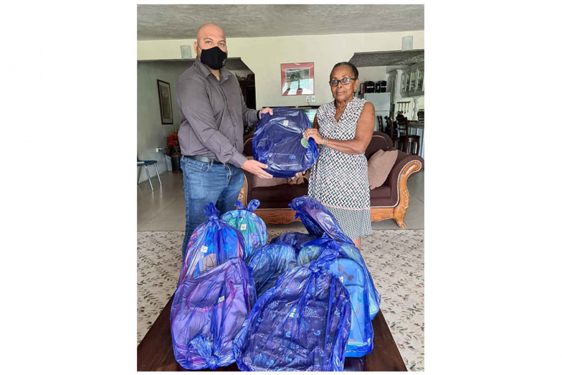 Chris Wever donates school bags,  school supplies to foster home