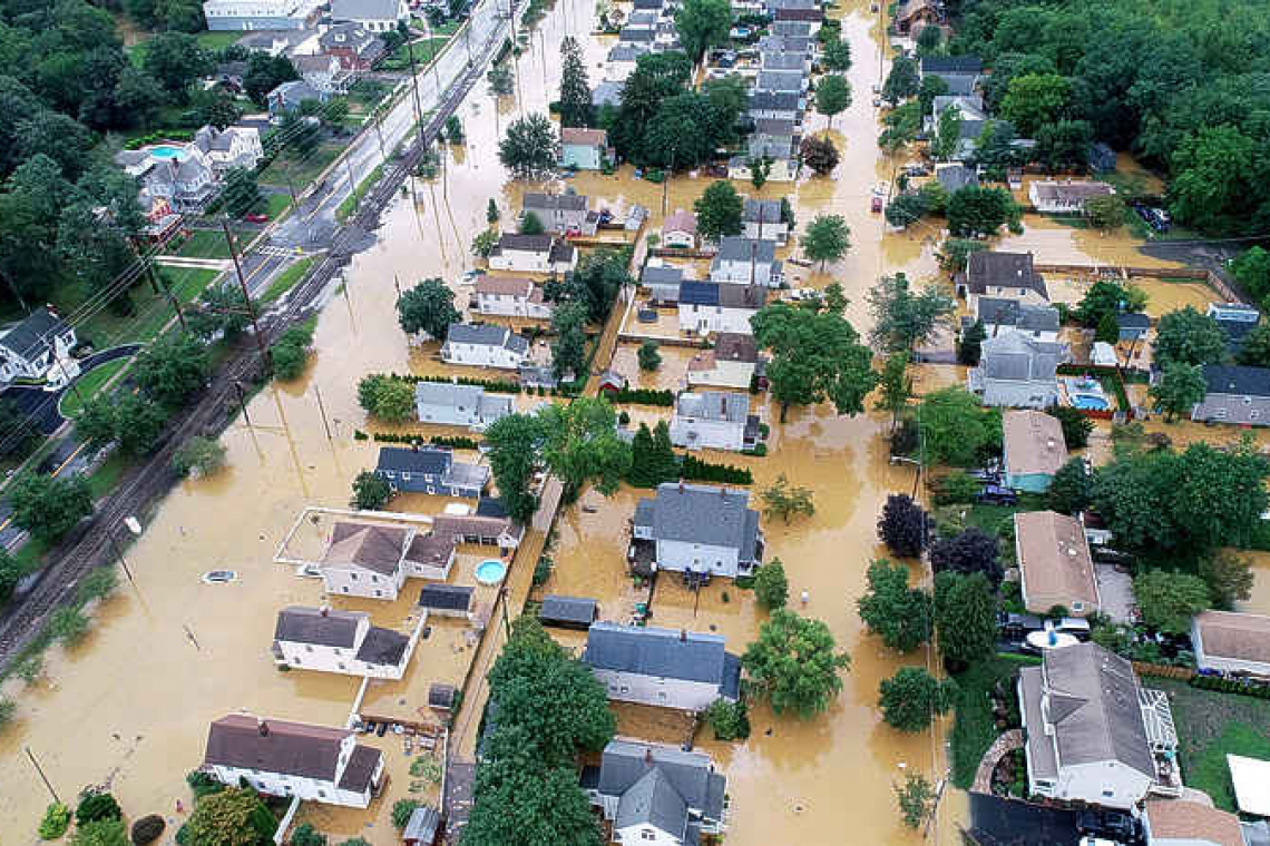 Weakened Henri expected to soak already drenched US Northeast