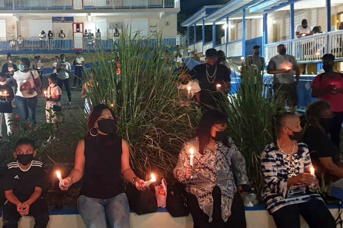 Hillside Schools honour beloved  secretary with candlelight vigil