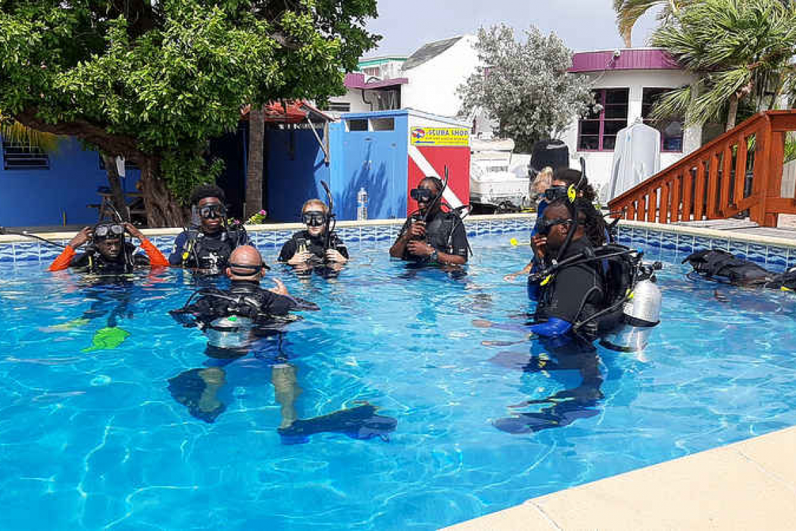 Diver certifications for six trainees  who participate in coastal clean-up