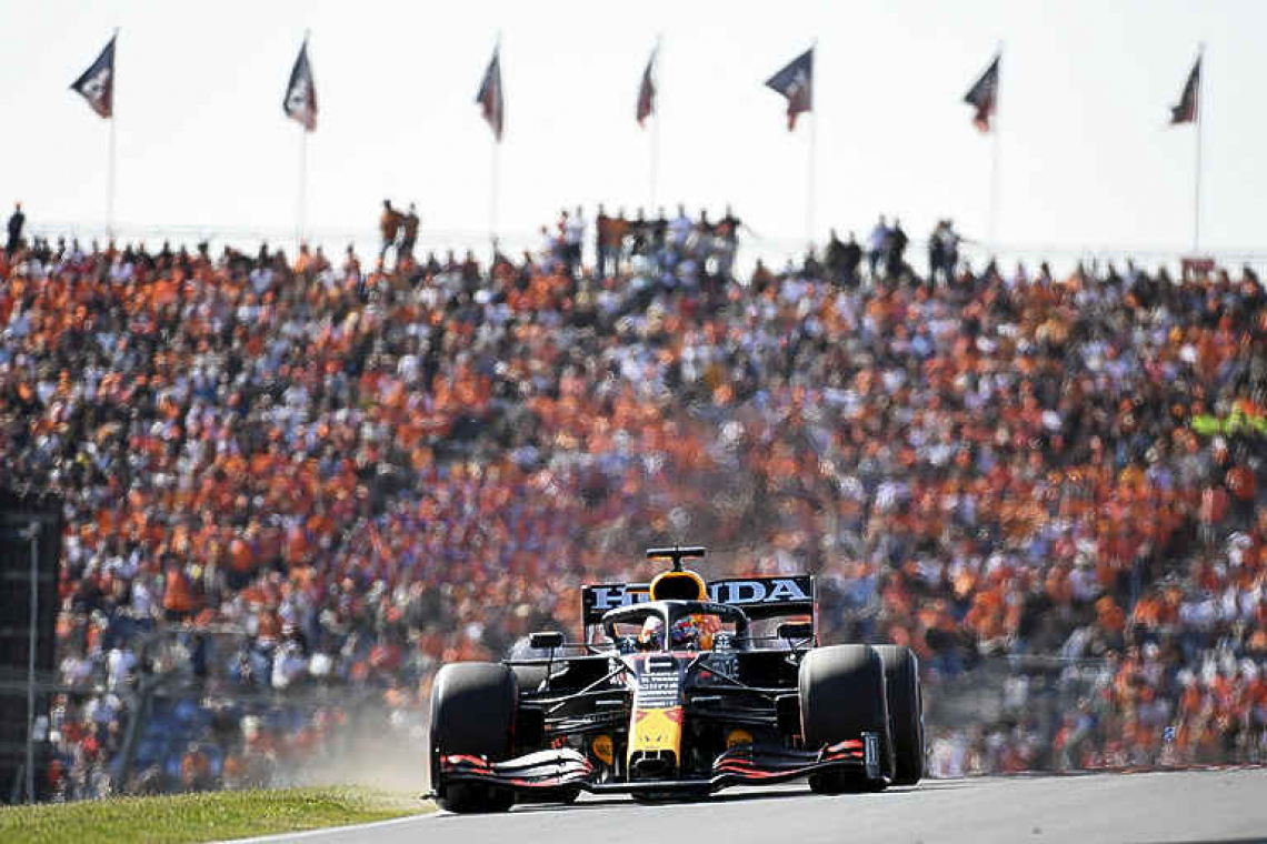 Verstappen triggers party with dominant home win
