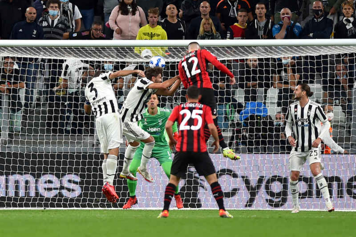 Rebic earns Milan late draw at winless Juve