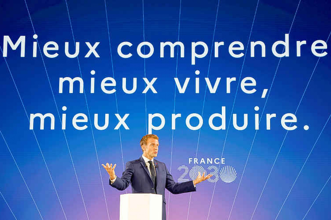 Macron unveils 30-billion euro plan for innovation and industrial revival