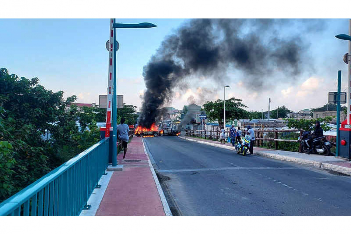 Protestors block roads on French side  after health pass becomes effective