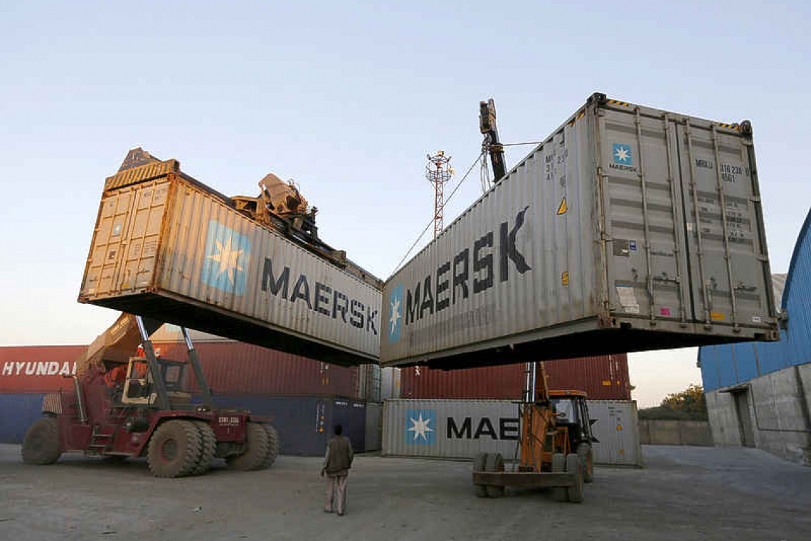 Maersk says port delays will stretch into new year