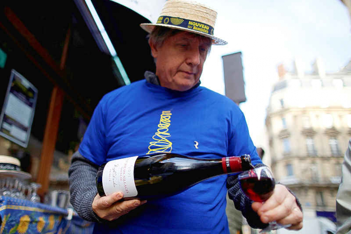 French wine lovers wash away climate and COVID-19 worries