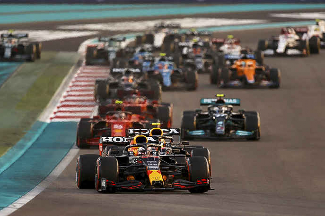 Verstappen wins first F1 title in last lap drama