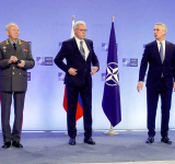 NATO offers arms talks as Russia warns of dangers