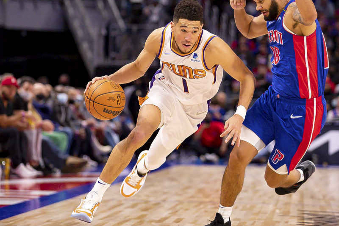    Devin Booker helps Suns demolish Pistons