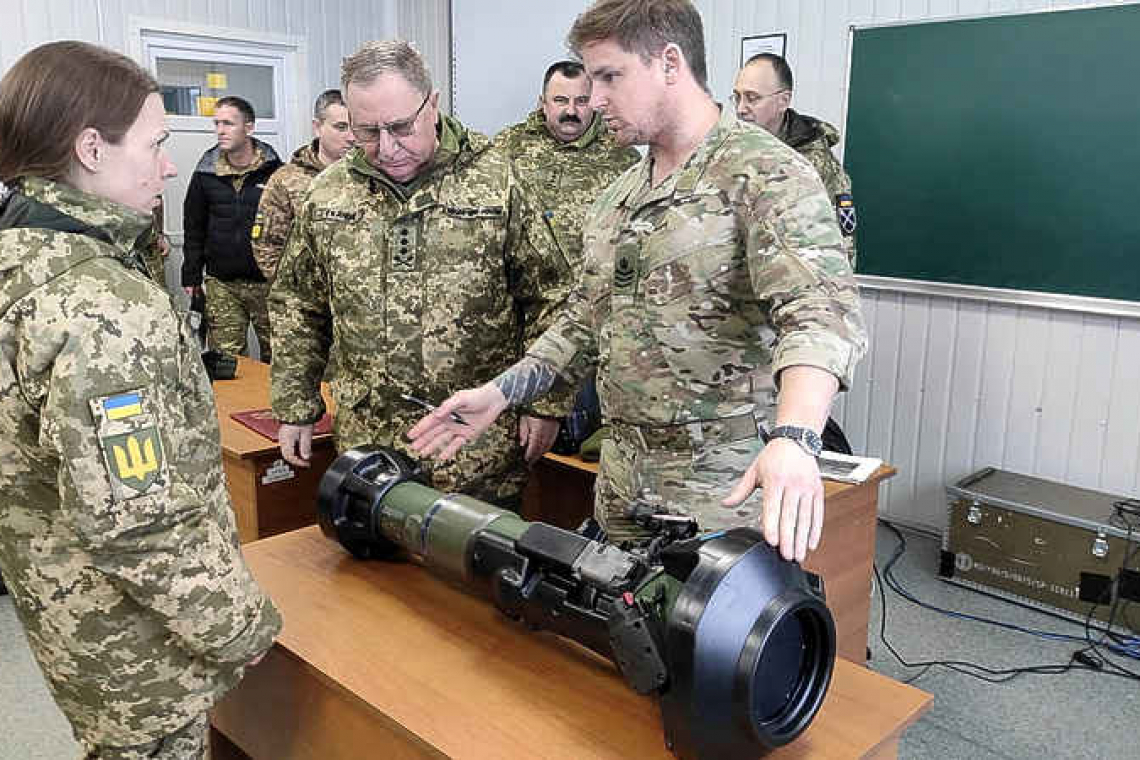 Biden warns Putin with sanctions as West steps up Ukraine defenses