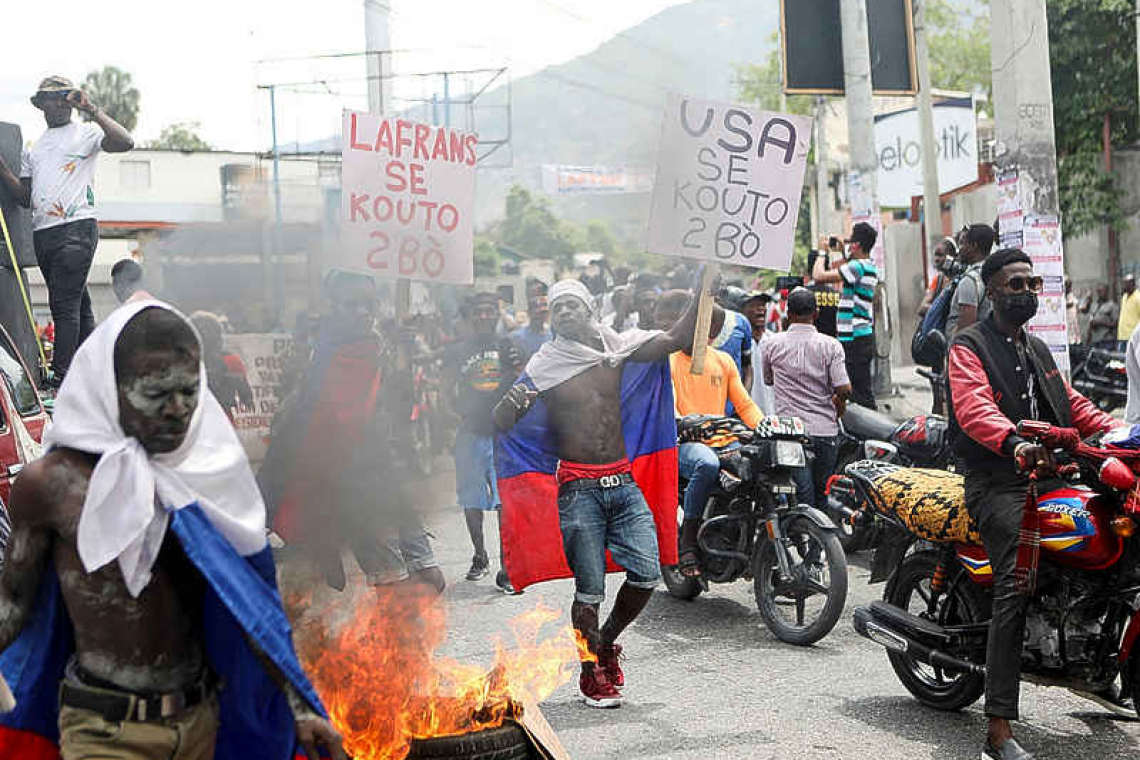 Haiti protesters burn US  missionary group plane   