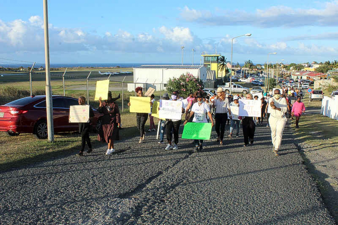 Silent march draws crowd,  petition presented to hospital   