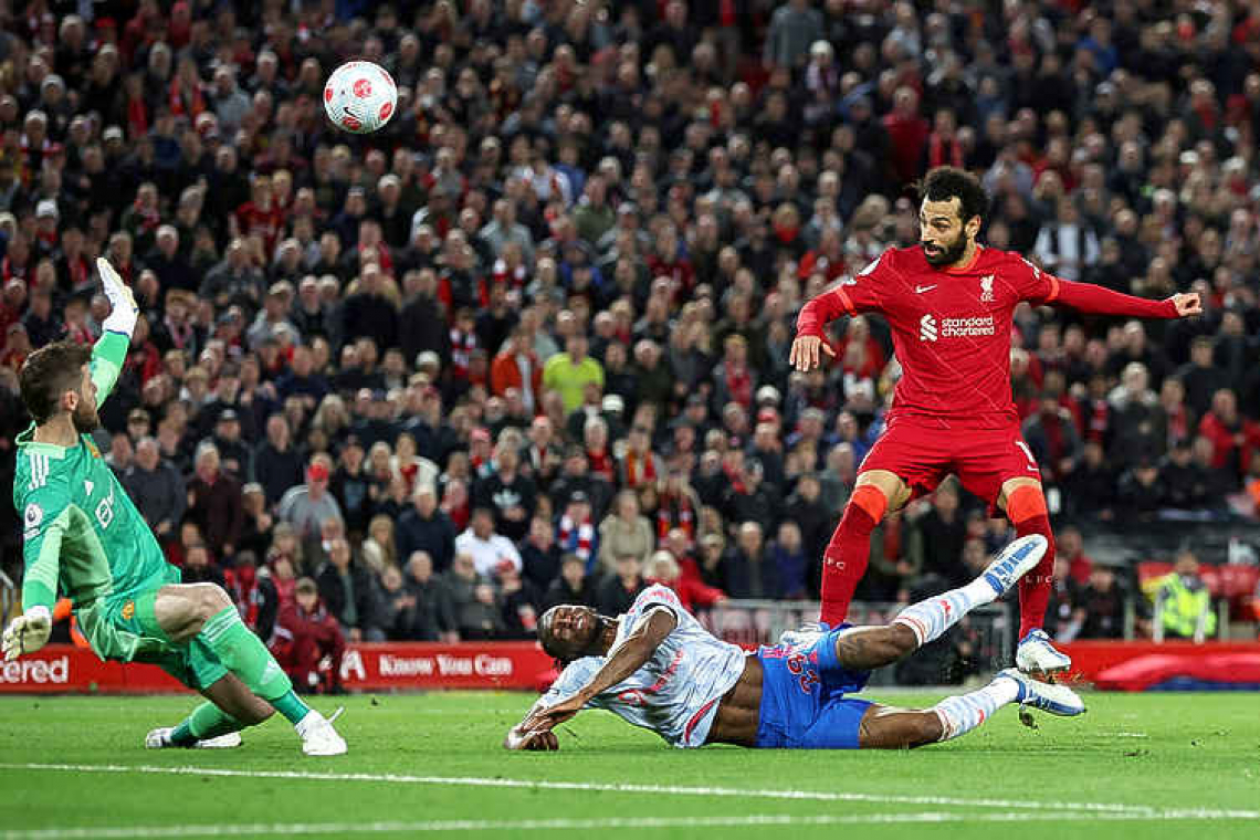 Liverpool go top after crushing United 4-0 with Salah double