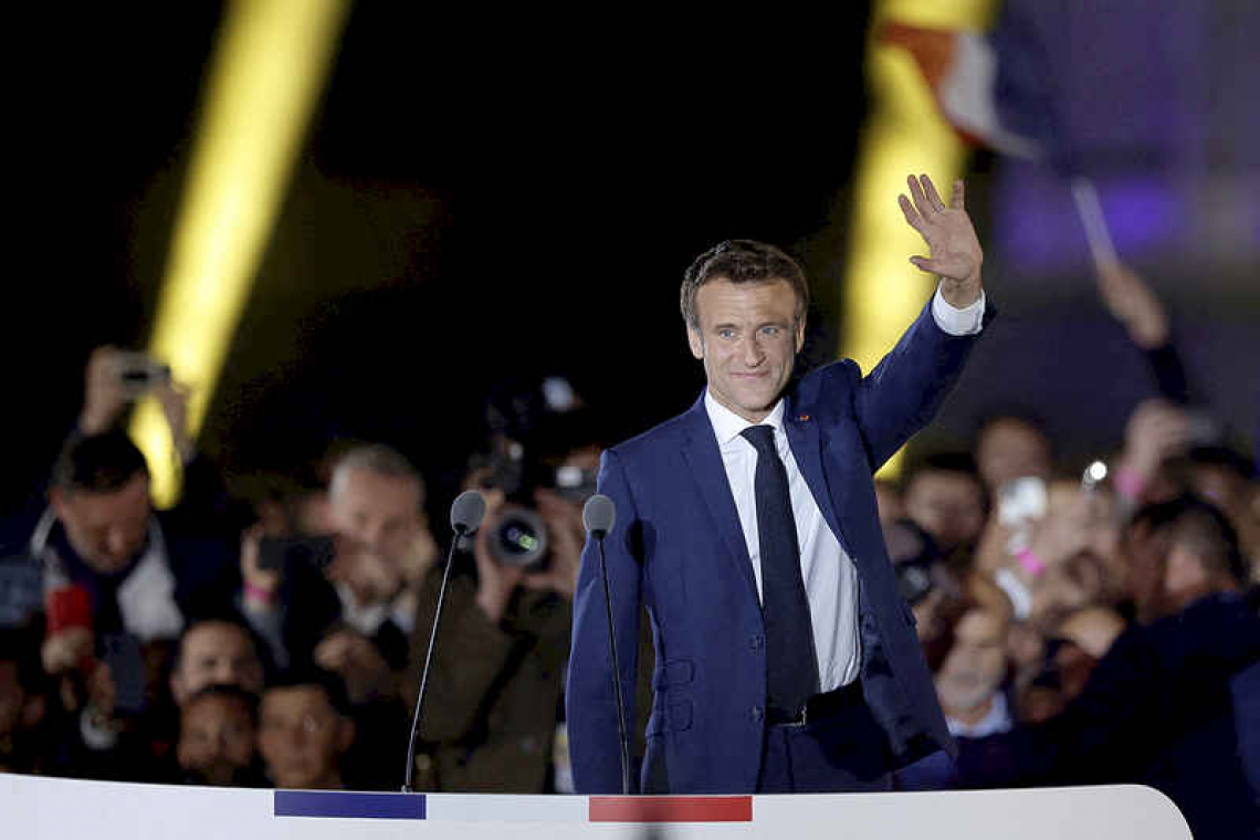 Macron wins re-election, dodges political earthquake