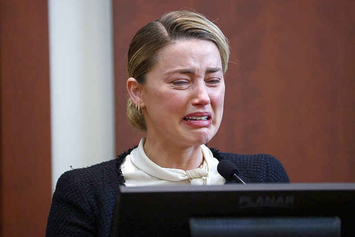 Sobbing Amber Heard accuses Johnny Depp of sexual assault