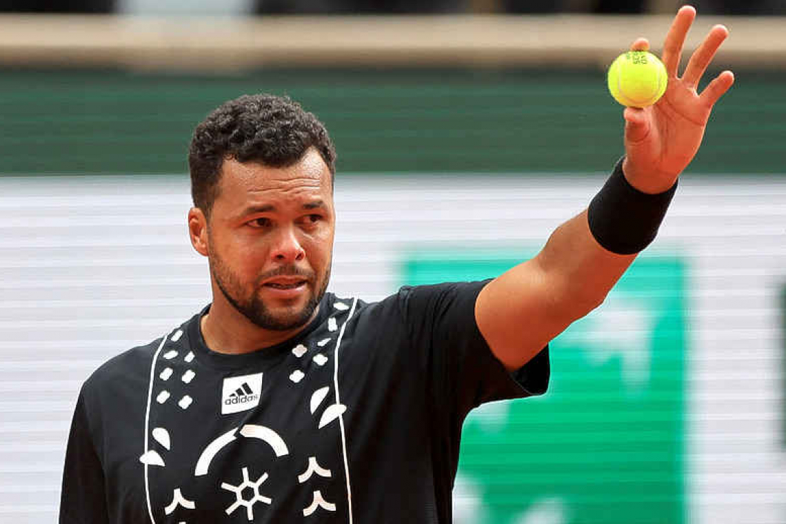 Tears flow as Tsonga retires after French Open defeat