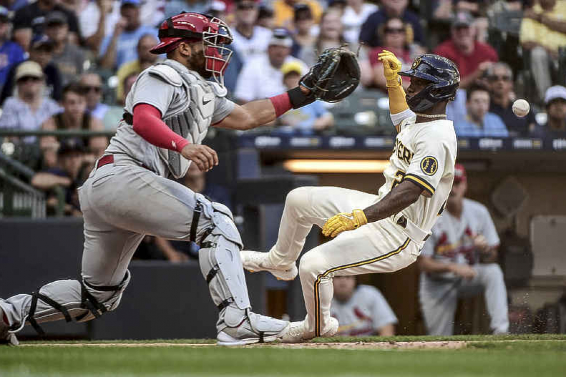 Tyrone Taylor powers Brewers past Cardinals