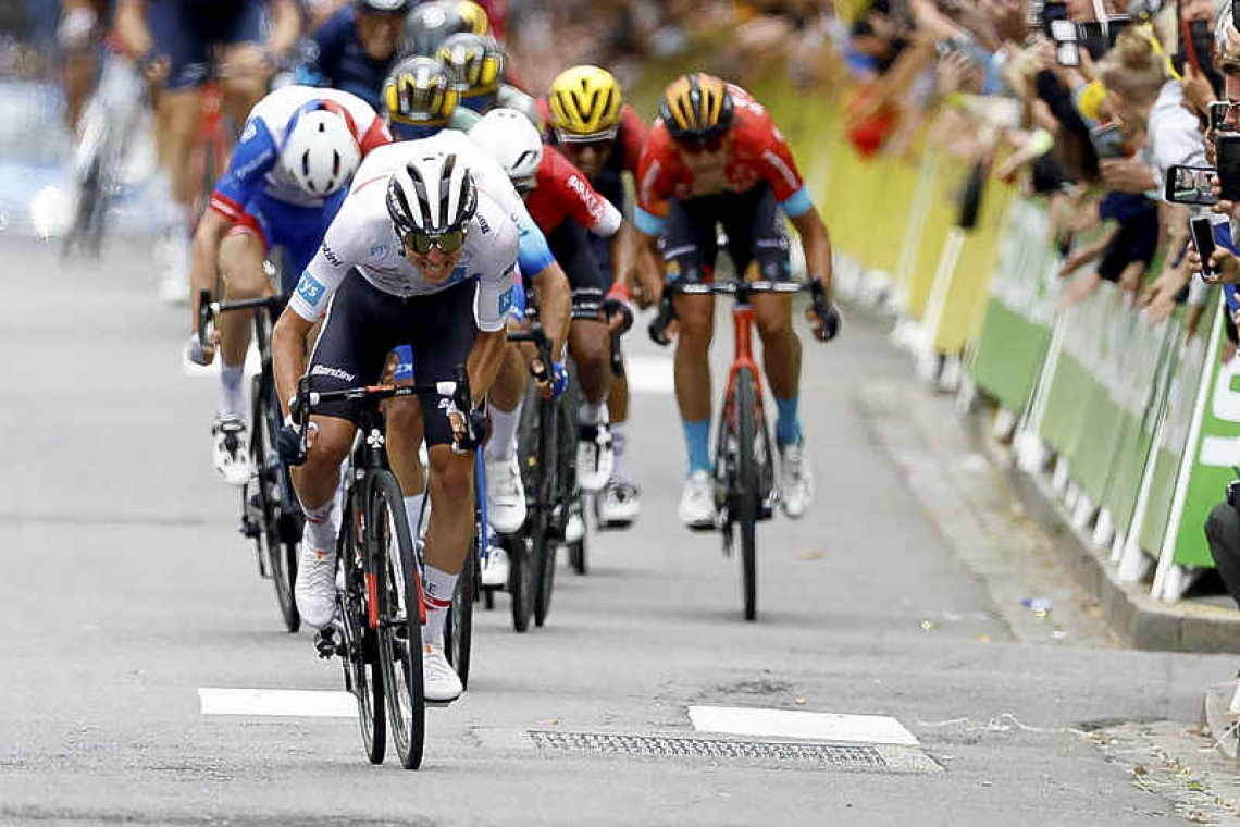 Pogacar wins Tour stage six to take yellow jersey from Van Aert