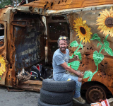 Artists painting flowers over Ukraine war wreckage, unsettling some locals