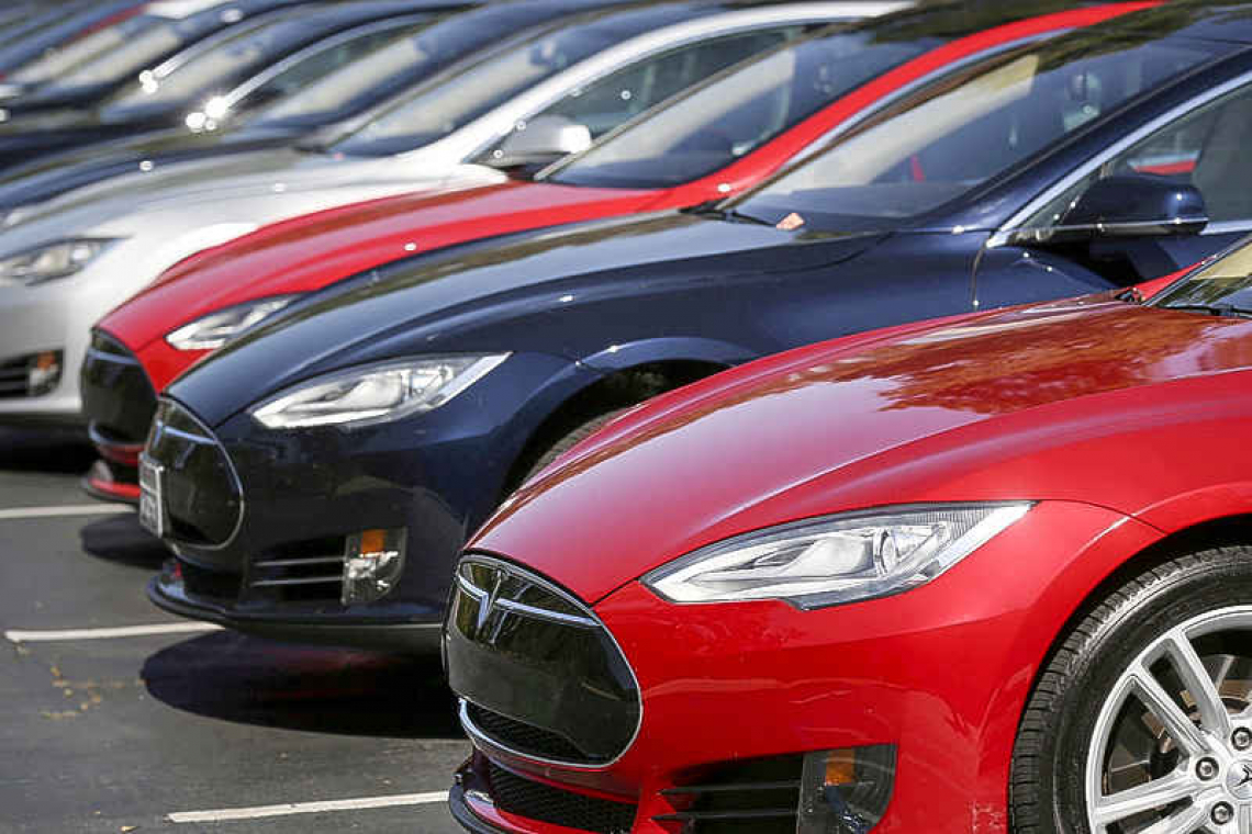 Tesla shares lower after 3-1 stock split