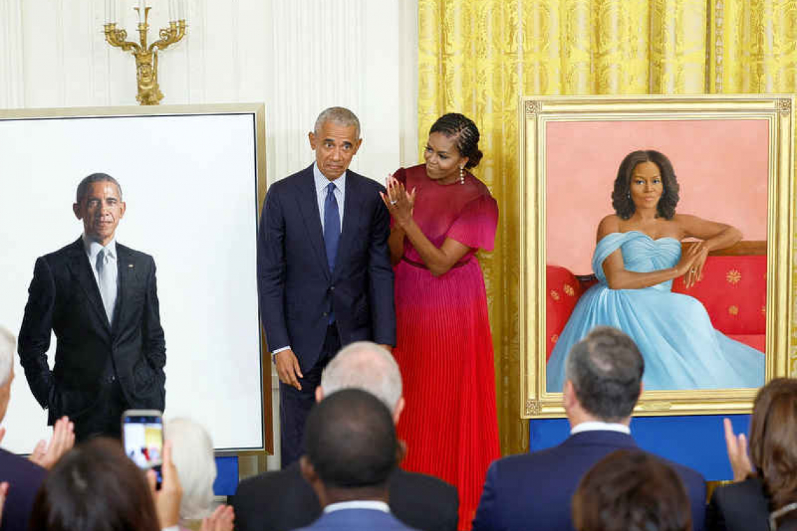 Obama presidential portrait unveiling features Trump barb and tan suit joke