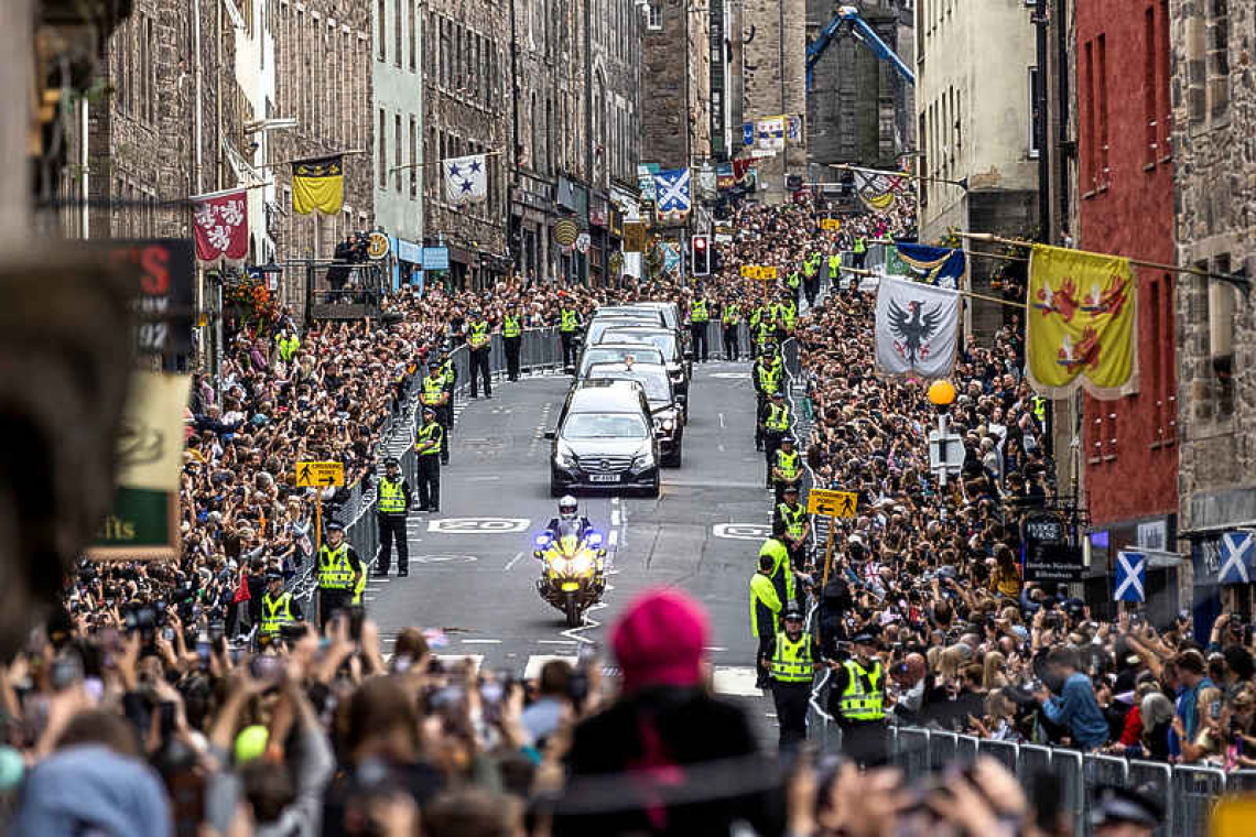 Queen Elizabeth's coffin arrives in Edinburgh as mourners line streets