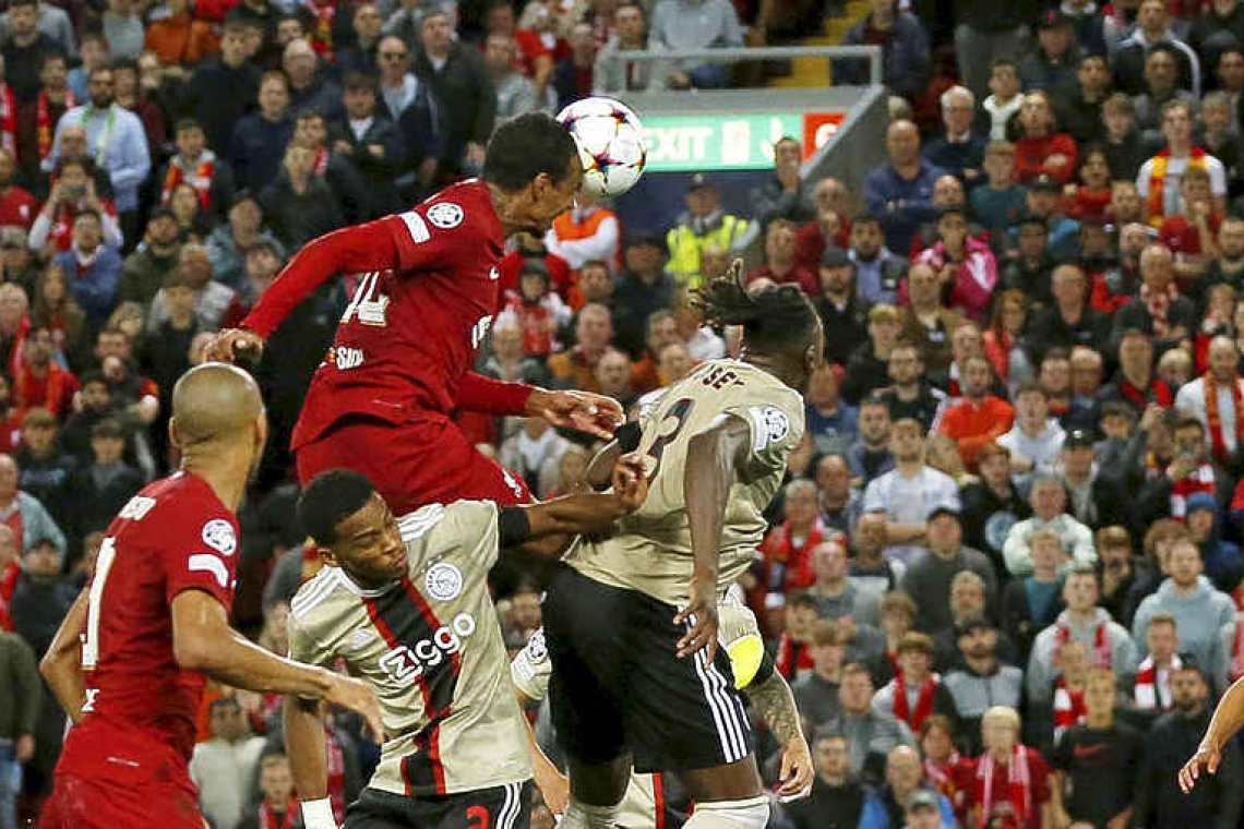 Late Matip header earns Liverpool victory over Ajax