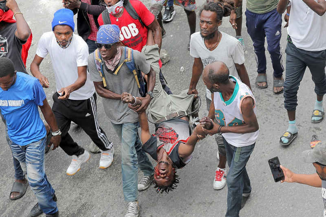    Violent protests flare up in Haiti over fuel price hikes and rampant crime
