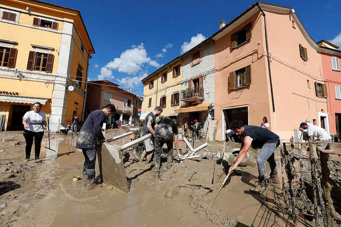 At least 10 dead as flash floods hit central Italy