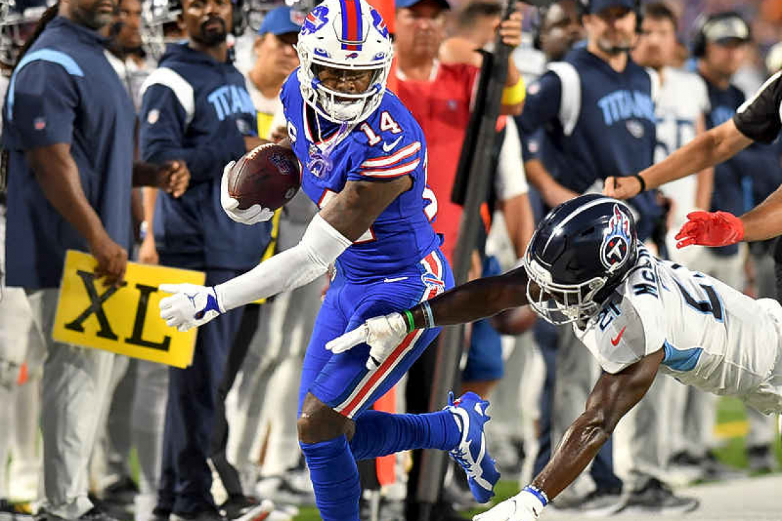 Josh Allen tosses 4 TDs as Bills crush Titans