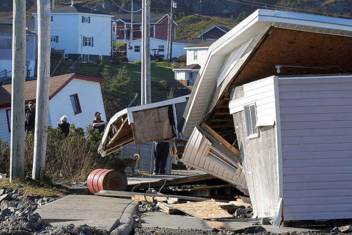 Canadians clean up after Fiona sweeps homes out to sea; 1 dead