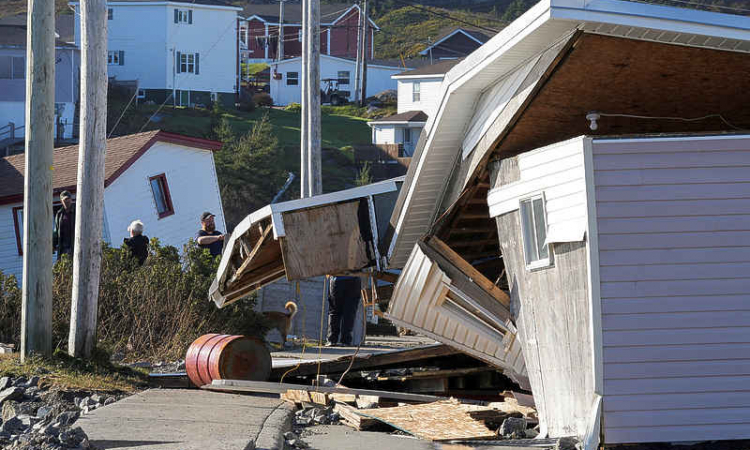 Canadians clean up after Fiona sweeps homes out to sea; 1 dead