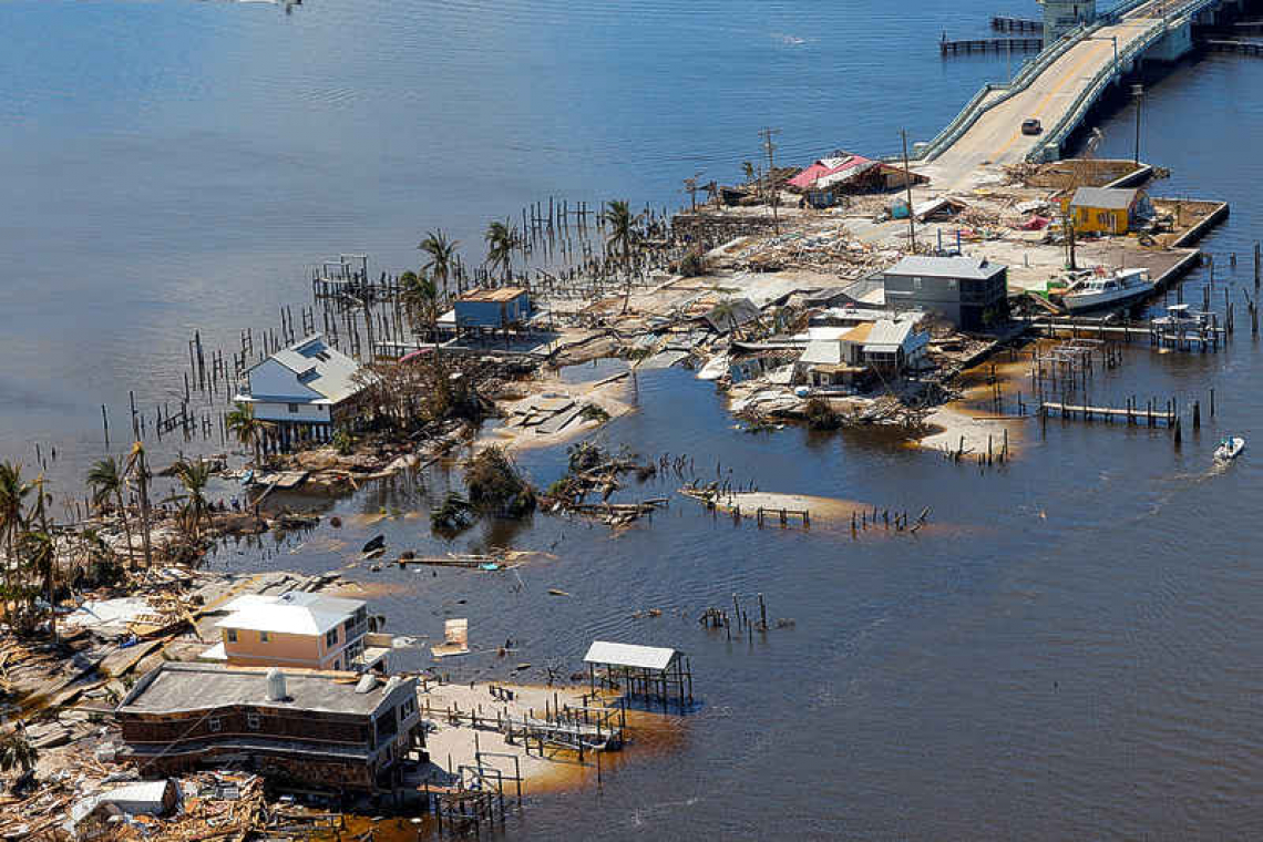 Hurricane Ian death toll climbs to 83, officials defend response