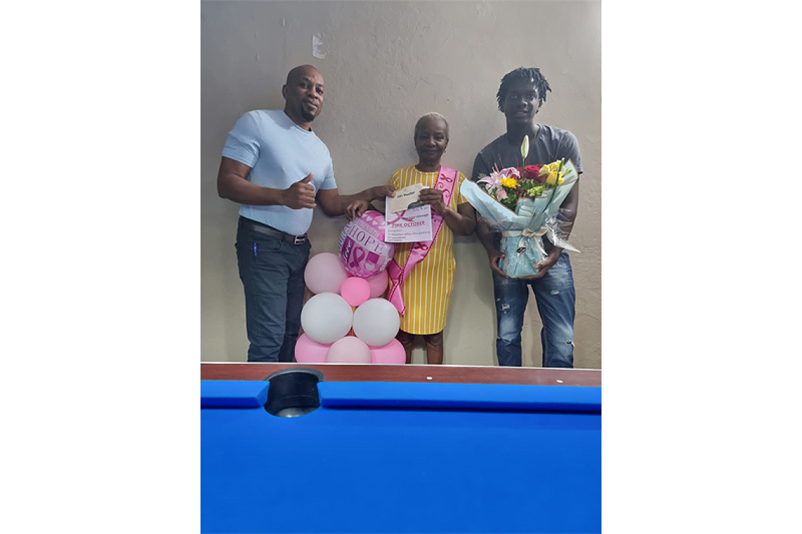 Pool Tournament winners honour cancer survivor