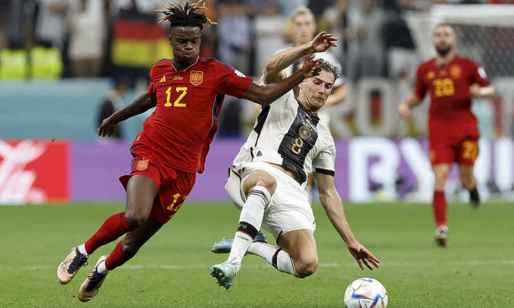 Germany breath life into World Cup campaign in battling draw with Spain