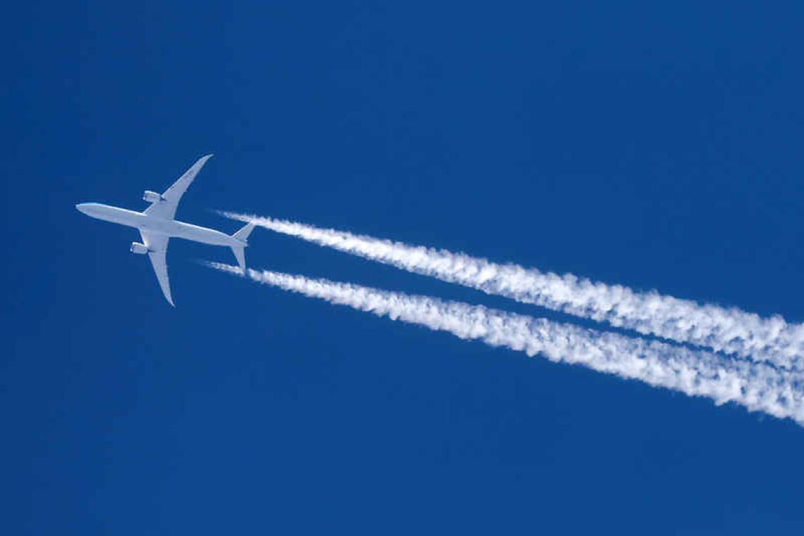 Europe agrees law to make airlines pay more to pollute