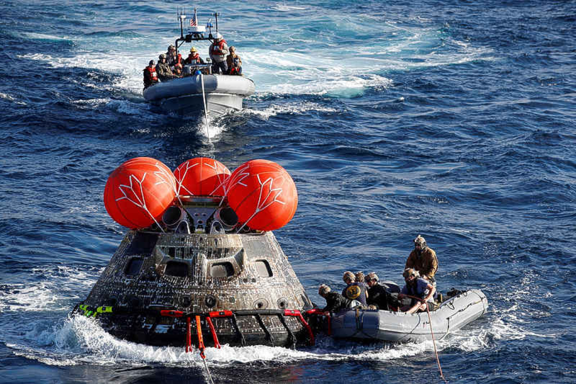 Orion capsule returns to Earth, capping Artemis I flight around moon