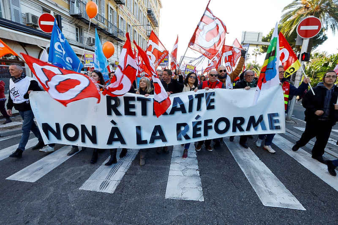 Huge crowds march across France against Macron's pension reform