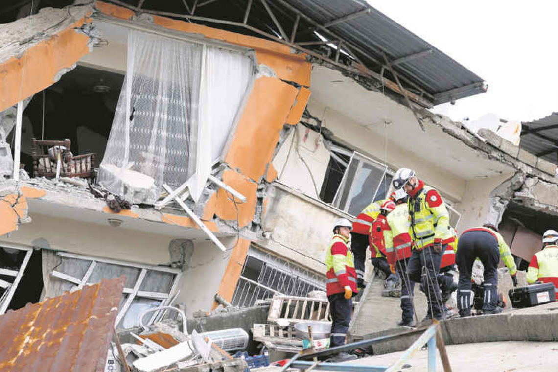 Rescuers dig through rubble, quake death toll passes 7,800