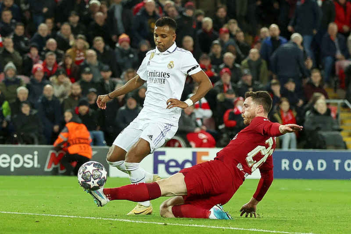 Real Madrid come from two down to earn stunning 5-2 win at Liverpool