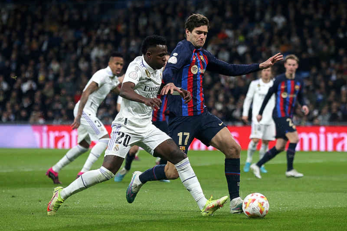 Barcelona earn gutsy 1-0 win at Real in semi-final first leg   