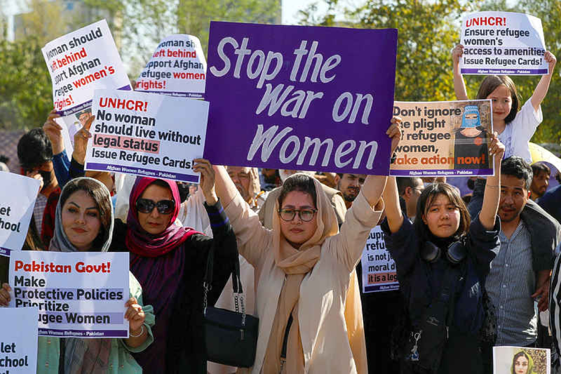 Women's Day protesters rally with the focus on Iran and Afghanistan