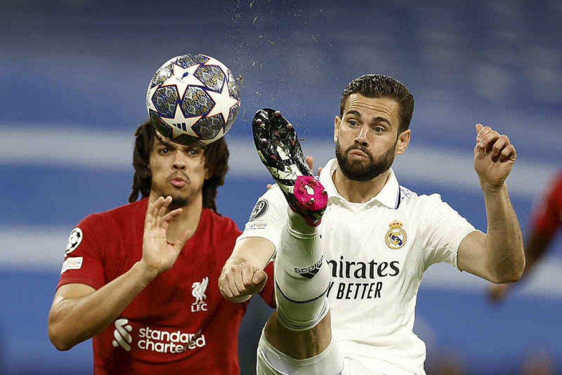 Real Madrid ease past Liverpool into Champions League quarters   