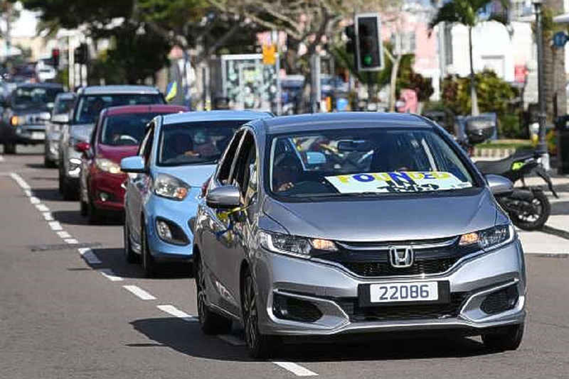 Motorcade rides length of island  to protest school closure Sat.