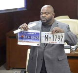 Chris: Numbers on licence plates too  small, asks if they will be recalled