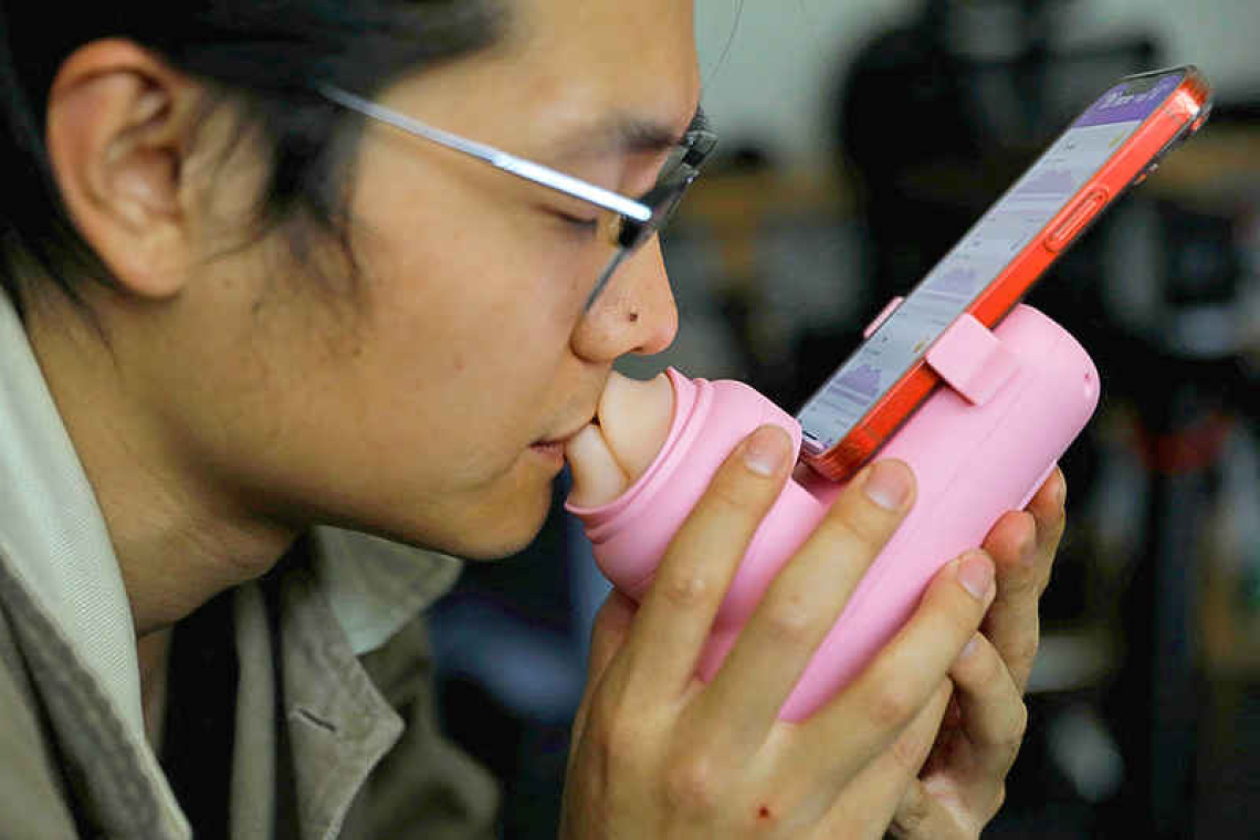Firm invents lockdown-inspired kissing machine for remote lovers