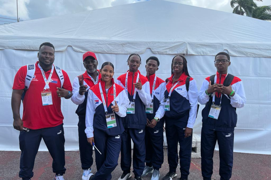 Minister Samuel congratulates Brison and team St. Maarten